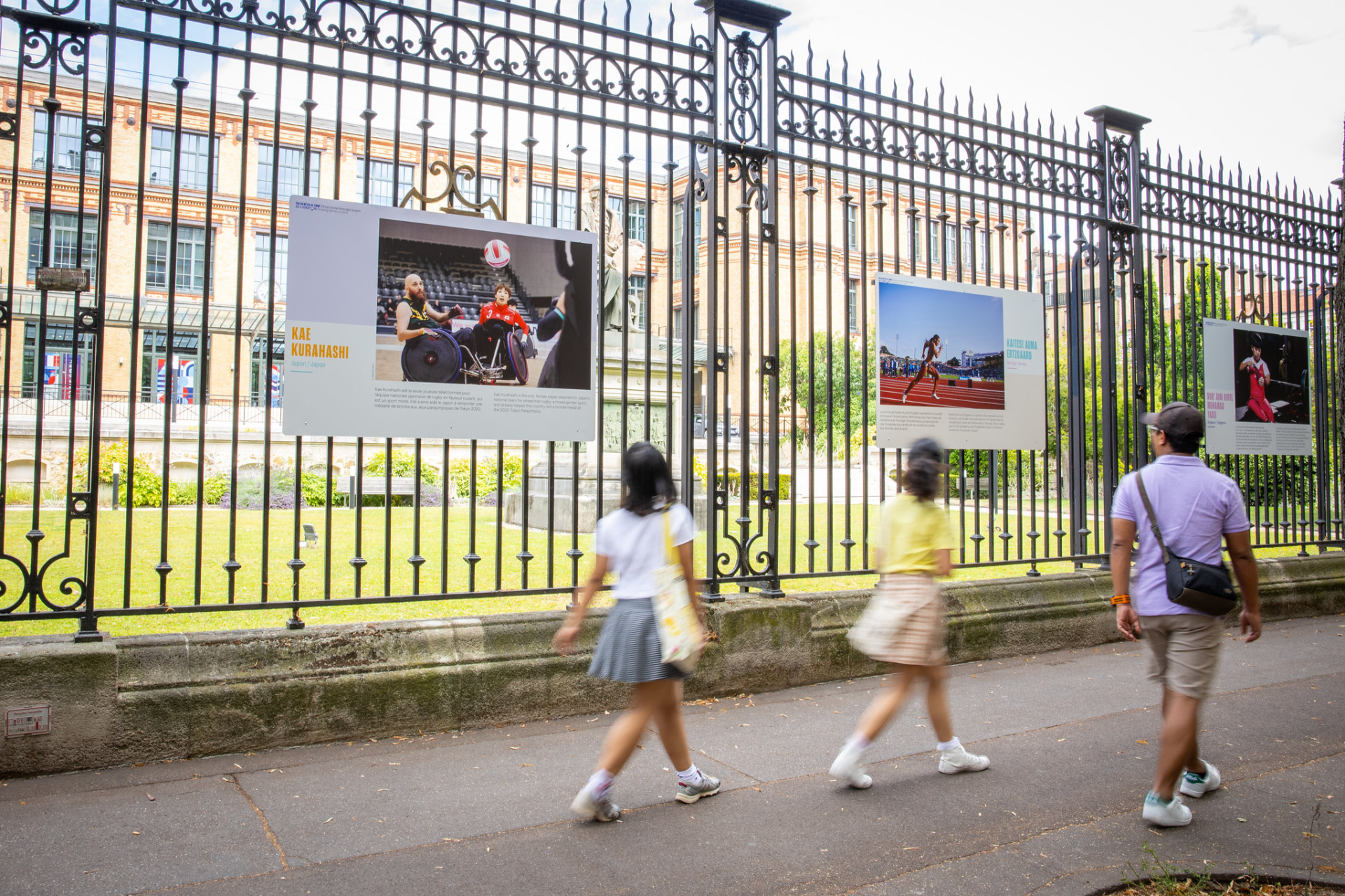 people passing by the exhibition "not a woman's job"