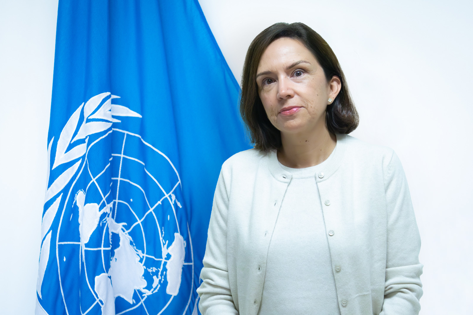 Photo Monica Varela Garcia with UN flag