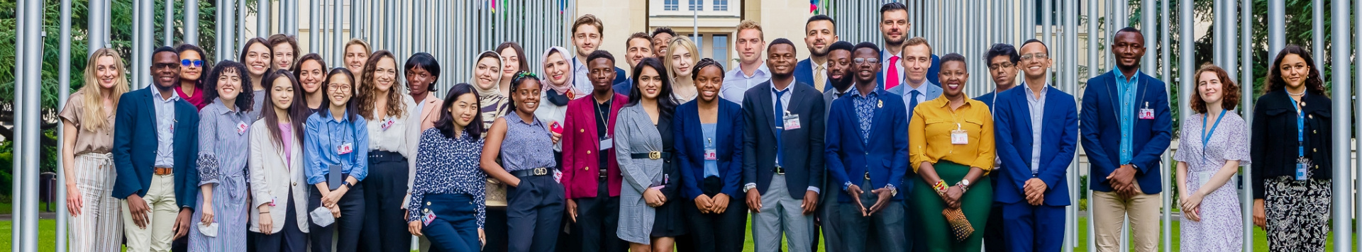 Graduate Study Programme participants group together for a photo in front of the Palais.